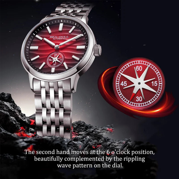 Silver watch with red dial on a dark background