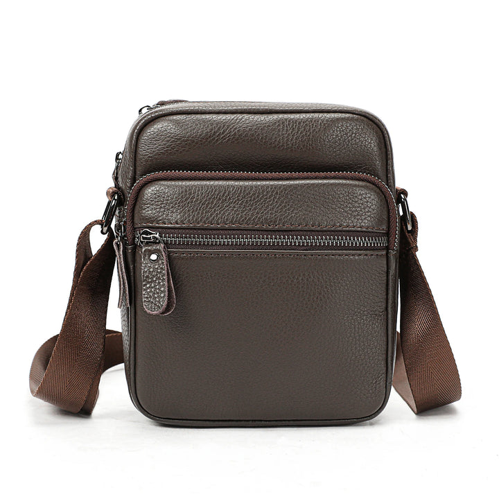 Brown leather crossbody bag on a white background
