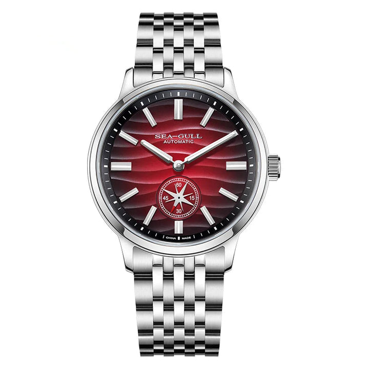 Sea-Gull watch with red face and silver metal strap on white background