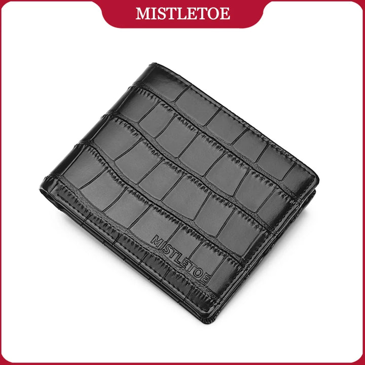Black cardholder with embossed pattern on a white background, branded 'Mistletoe'.