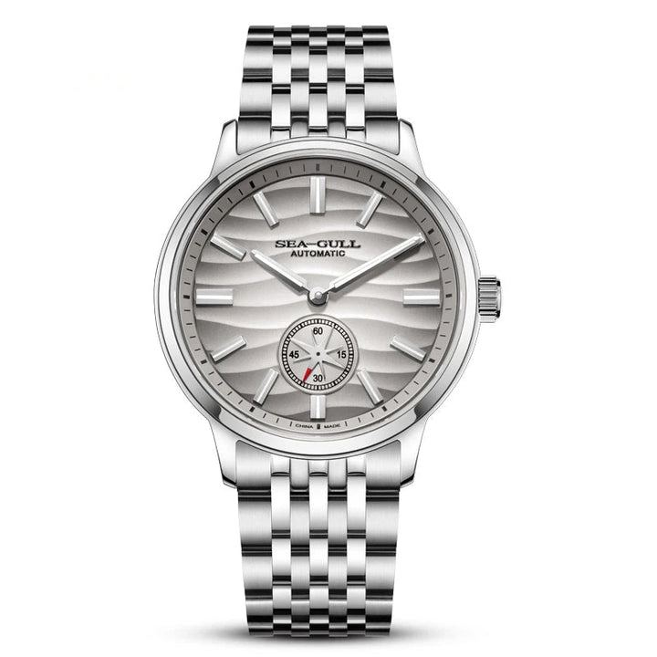 Silver wristwatch with detailed face on a white background, featuring the Sea-Gull brand.