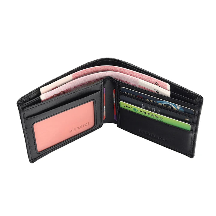 Black wallet with pink cardholder and various cards inside on a white background